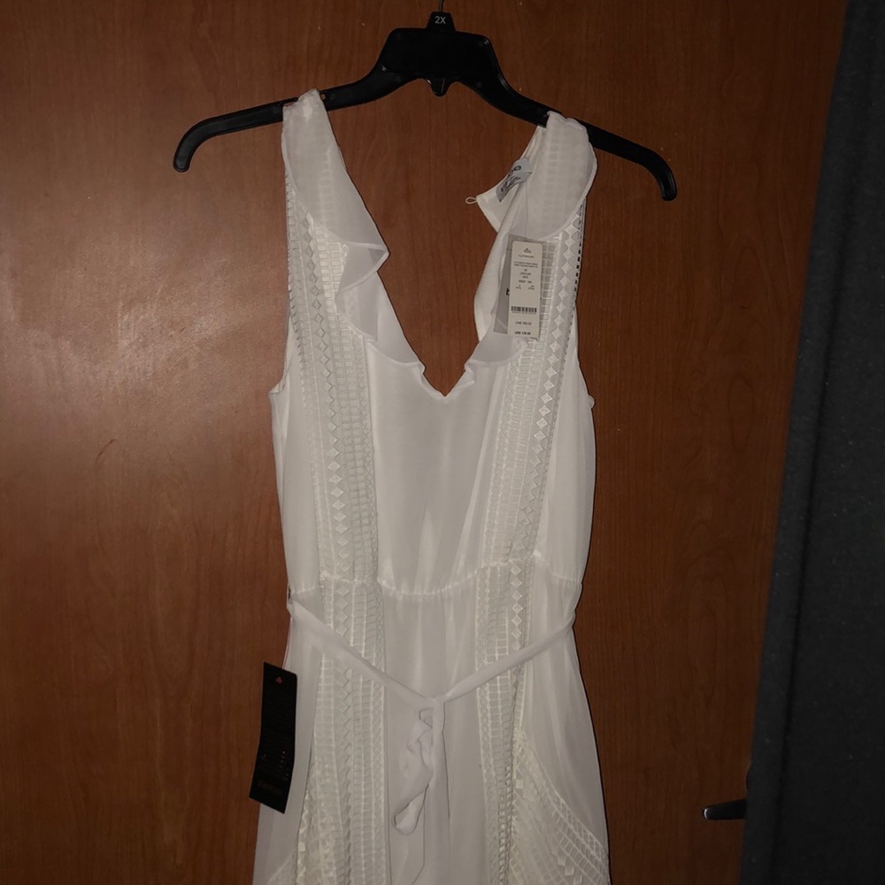 A white Bebe dress ,size large.